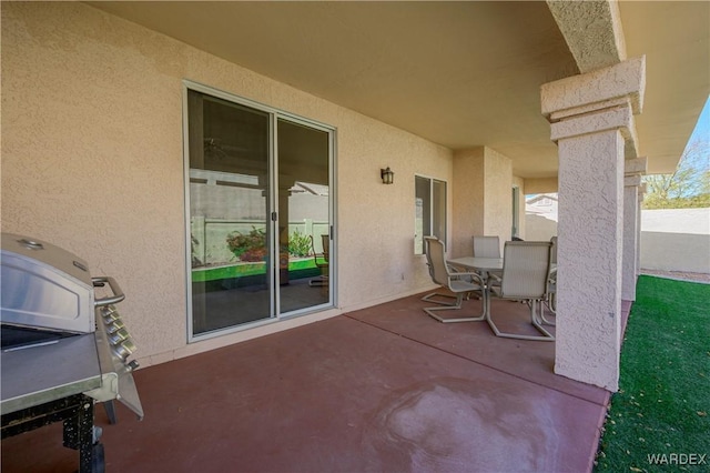 view of patio with outdoor dining area