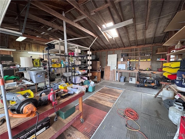 garage with a workshop area