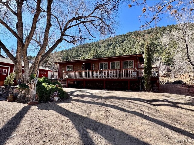 view of front of house with a deck