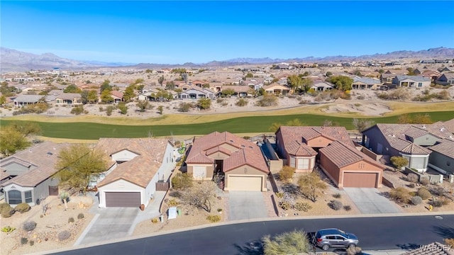 bird's eye view featuring a residential view, a mountain view, and golf course view