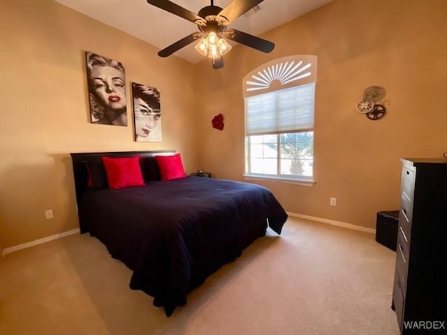 bedroom with ceiling fan, visible vents, baseboards, and light colored carpet