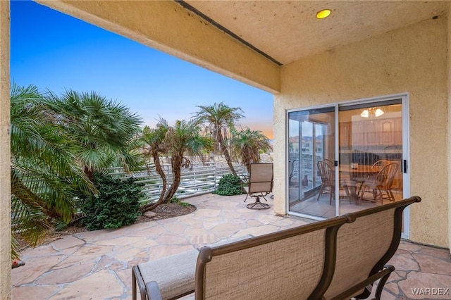 patio terrace at dusk with fence