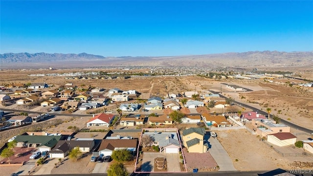 bird's eye view featuring a residential view and a mountain view