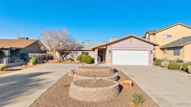 single story home featuring a chimney, stucco siding, concrete driveway, an attached garage, and fence