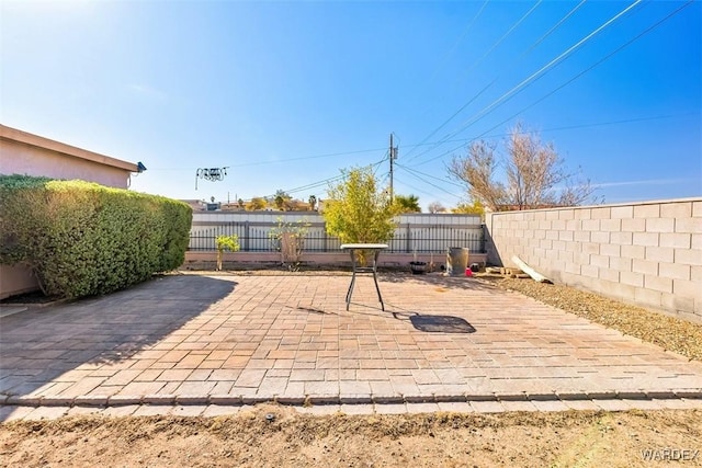 view of patio featuring a fenced backyard