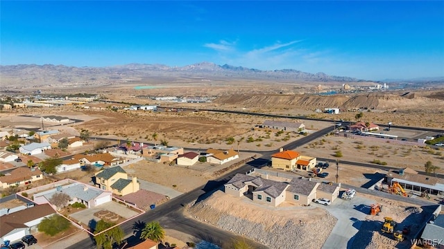 bird's eye view with a residential view, a mountain view, and a desert view