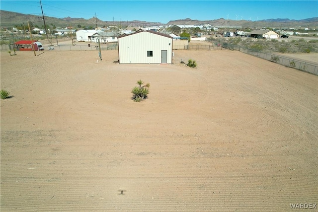 drone / aerial view featuring a mountain view