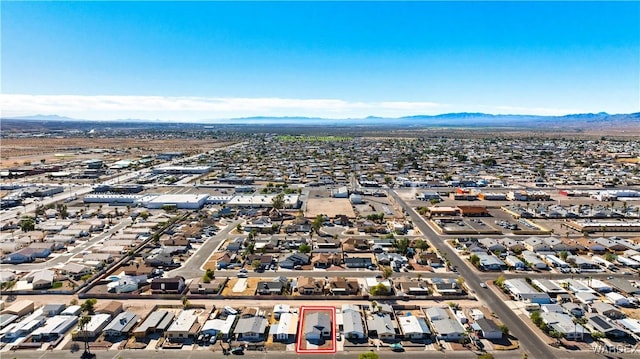 drone / aerial view with a residential view and a mountain view