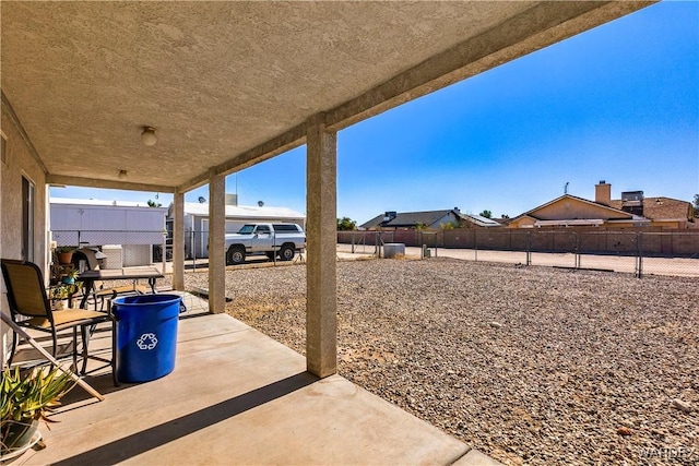 view of patio / terrace with fence