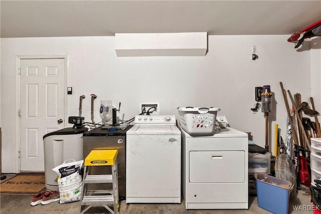 laundry room featuring laundry area and washing machine and dryer