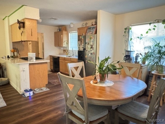 dining room with dark wood-style floors