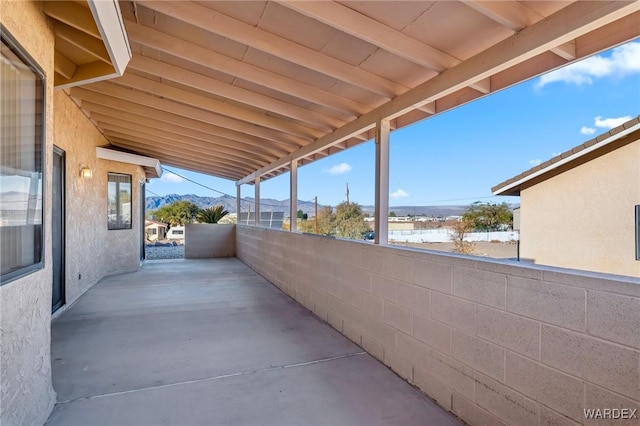 view of patio / terrace featuring a mountain view