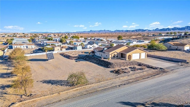 birds eye view of property featuring a residential view and a mountain view