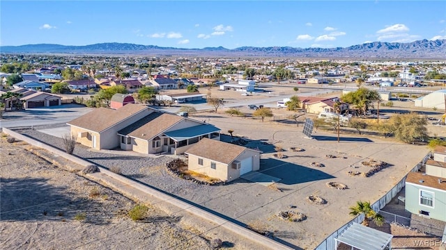 birds eye view of property with a residential view and a mountain view