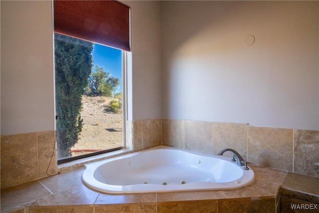 bathroom with a jetted tub