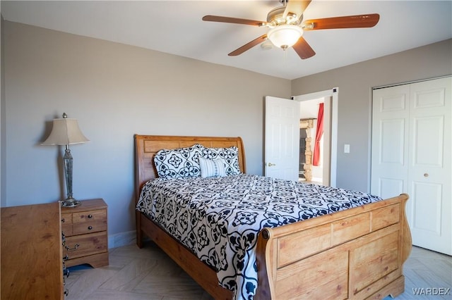 bedroom with a closet and a ceiling fan