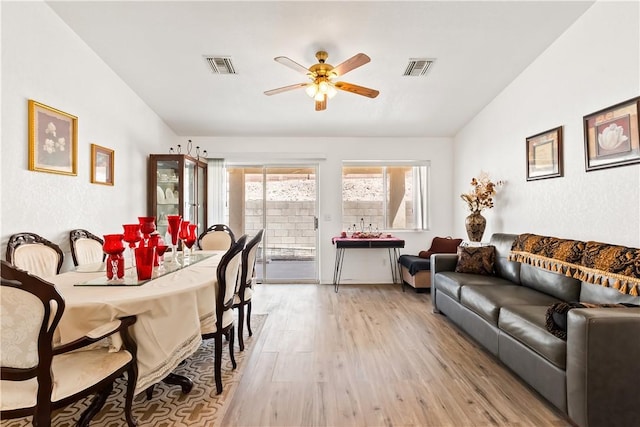 2191 Sierra Santiago, Bullhead City, AZ 86442 - dining area with a ceiling fan, light wood finished floors, and lofted ceiling