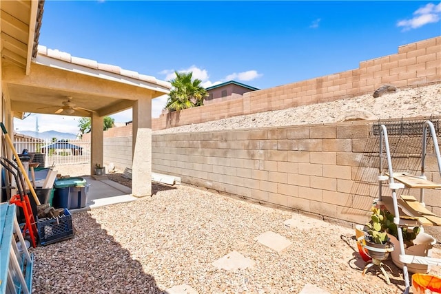 2191 Sierra Santiago, Bullhead City, AZ 86442 - fenced backyard featuring a ceiling fan and a patio
