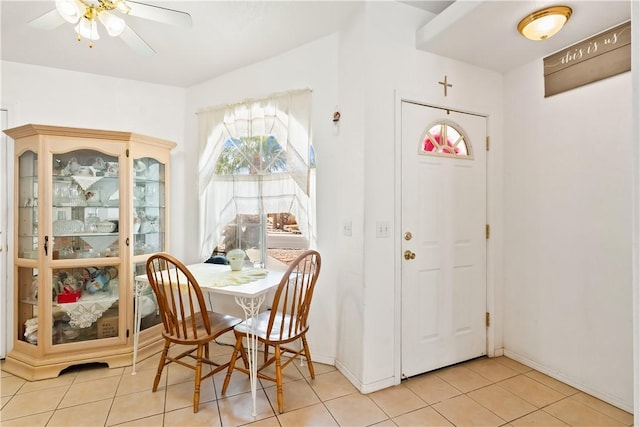 2191 Sierra Santiago, Bullhead City, AZ 86442 - dining room with light tile patterned floors, ceiling fan, and baseboards