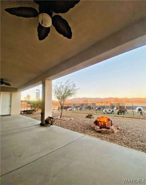 view of patio / terrace with a ceiling fan