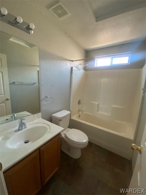 bathroom with visible vents, toilet, shower / bathtub combination, a textured ceiling, and vanity