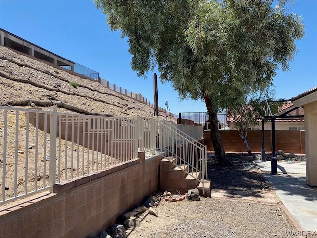 view of yard featuring fence