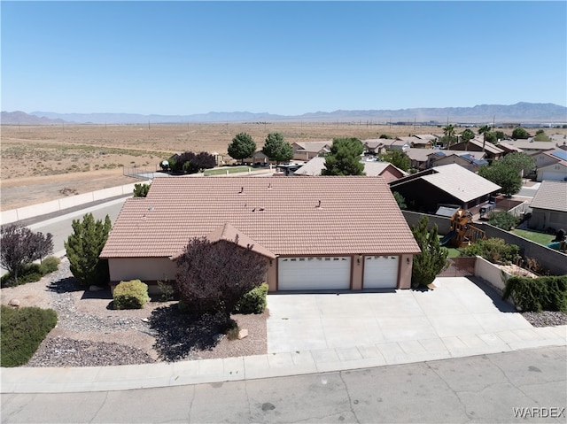 aerial view featuring a residential view and a mountain view