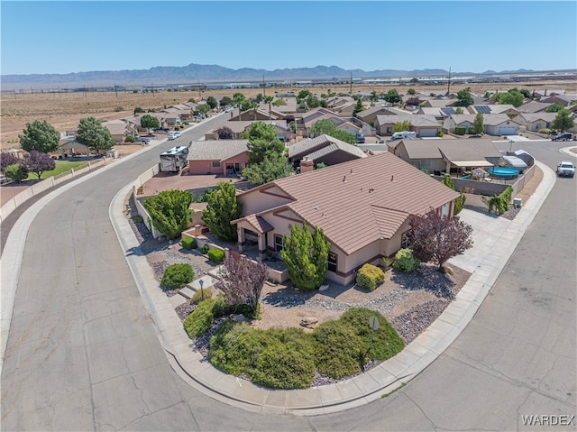 aerial view with a residential view and a mountain view