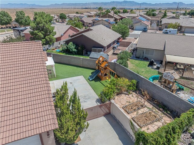 bird's eye view featuring a residential view and a mountain view