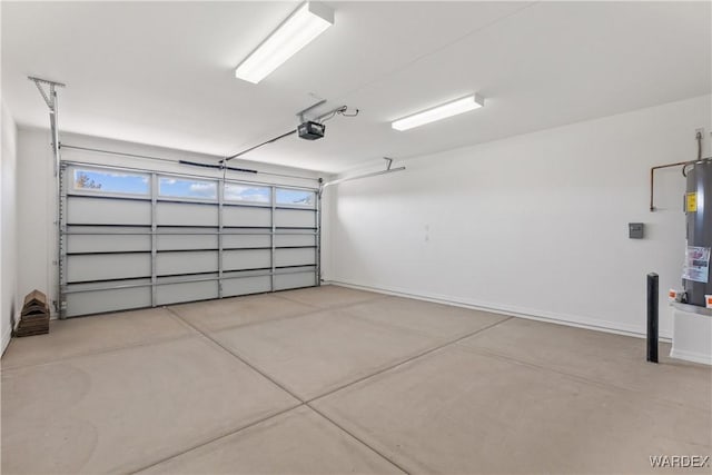 garage with baseboards and a garage door opener