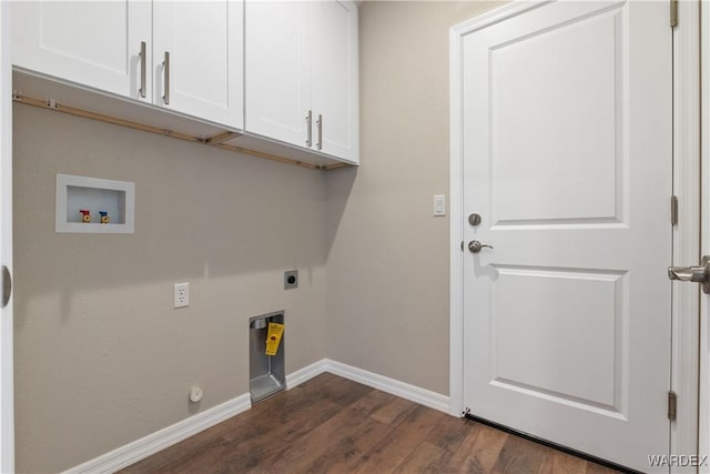 clothes washing area with hookup for an electric dryer, dark wood-style flooring, washer hookup, baseboards, and cabinet space