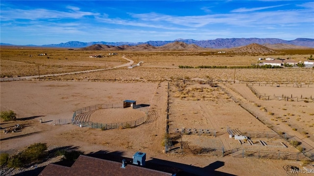 aerial view featuring view of desert and a mountain view