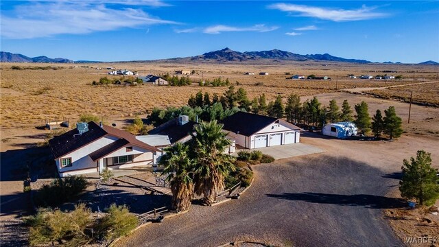 aerial view featuring a rural view and a mountain view