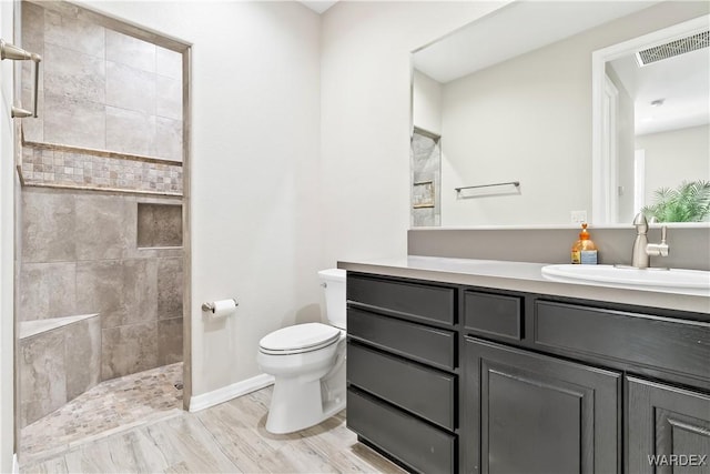 2542 E Alterna Dr, Fort Mohave, AZ 86426 - full bath featuring vanity, walk in shower, baseboards, toilet, and visible vents