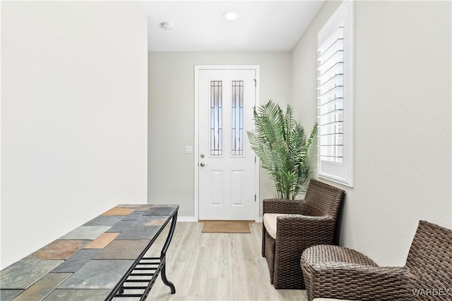 2542 E Alterna Dr, Fort Mohave, AZ 86426 - doorway to outside featuring light wood-style flooring