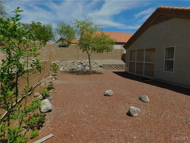 view of yard featuring a fenced backyard