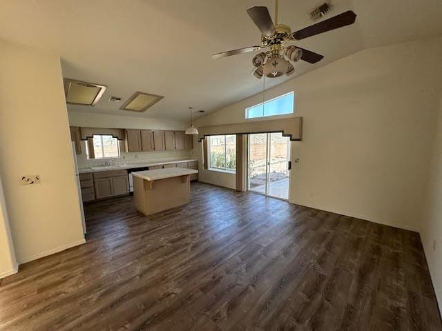 2195 Hijolly Dr, Bullhead City, AZ 86442 - kitchen with lofted ceiling, a kitchen island, light countertops, ceiling fan, and open floor plan