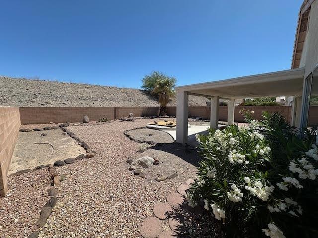 2195 Hijolly Dr, Bullhead City, AZ 86442 - fenced backyard with a patio