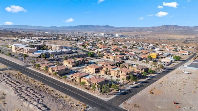 bird's eye view with a residential view and a mountain view