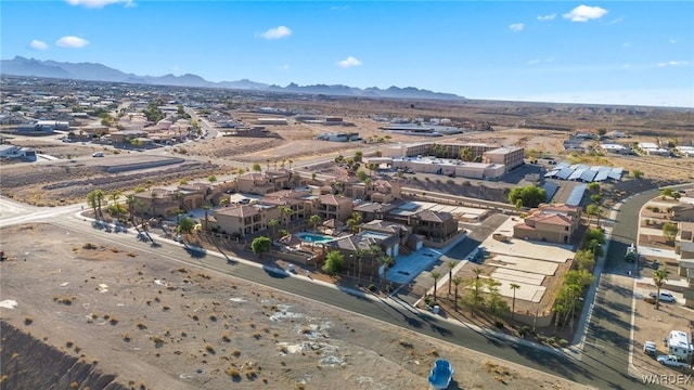 drone / aerial view featuring a residential view and a mountain view