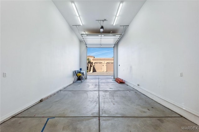 garage featuring baseboards