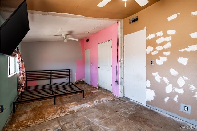 unfurnished bedroom featuring visible vents and ceiling fan