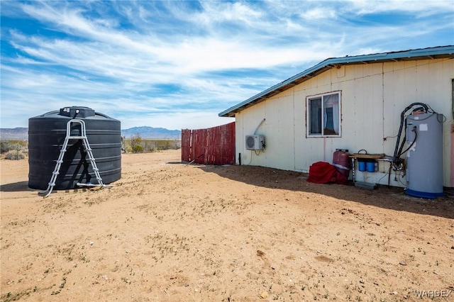 exterior space featuring water heater and a mountain view