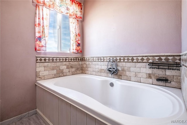 bathroom featuring a garden tub