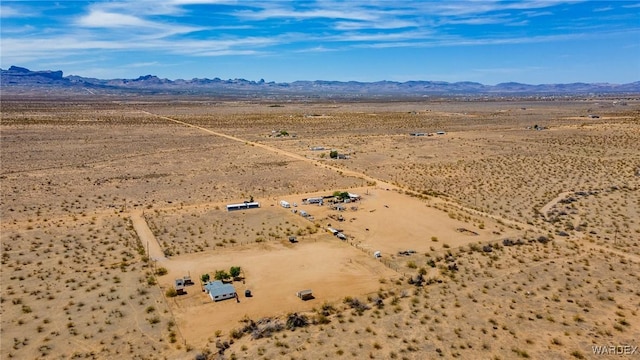 birds eye view of property with a rural view, a desert view, and a mountain view
