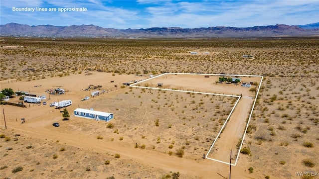 aerial view with a rural view, a desert view, and a mountain view