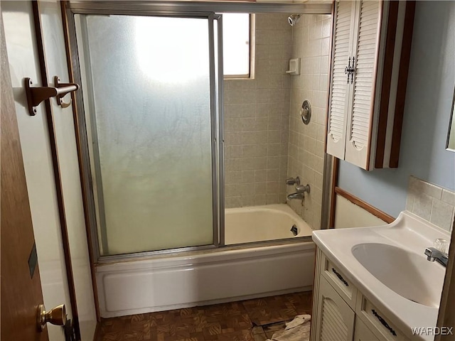 full bath featuring vanity and enclosed tub / shower combo