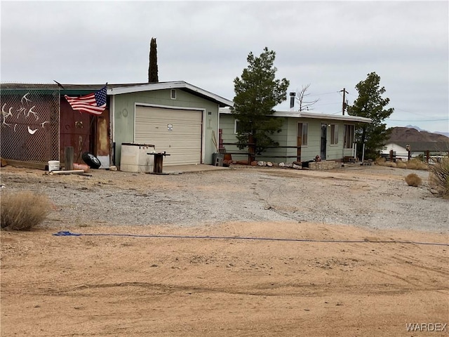 view of front of house featuring a garage and driveway