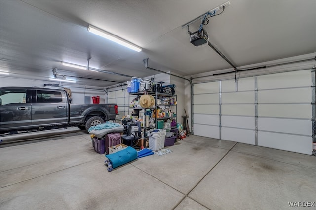 garage featuring a garage door opener