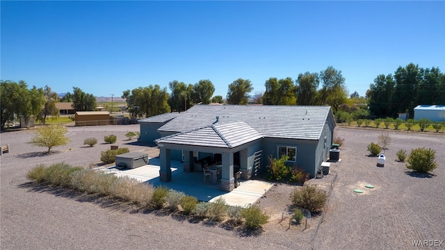 view of front of home featuring a patio area